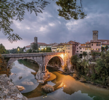 A wide-angle shot of Cividale del Friuli, Italy in the evening